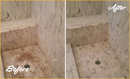 Before and After Picture of a Dirty Brookshire Marble Shower Cleaned to Eliminate Dark Stains