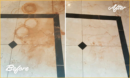 Before and After Picture of a Brookshire Hard Surface Restoration Service on a Marble Floor to Eliminate Rust Stains