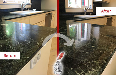 Before and After Picture of a Black Marble Countertop Restored to Remove Water Marks